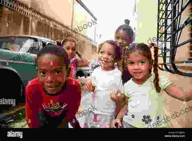 A Group Of Smiling Cuban Children Playing In The Street The Other Side Of Paradise: Life In The New Cuba