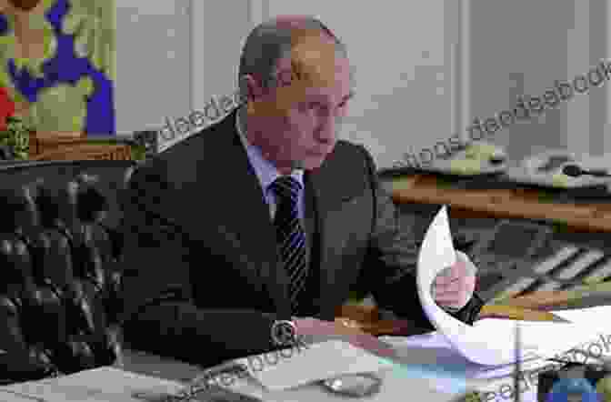 Vladimir Putin Sitting At A Desk In The Kremlin Putin Philip Short